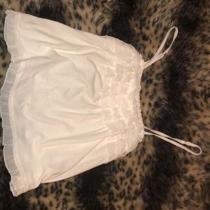 White ruffled tank